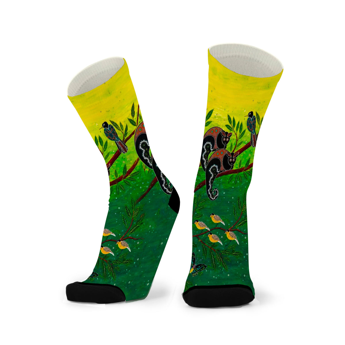 Canopy Encounters by Melanie Hava: pair of yellow and green bamboo socks with animals among trees.