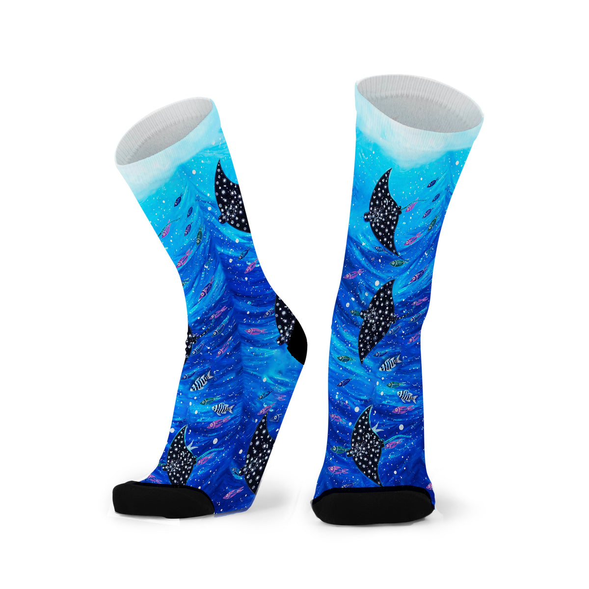 Ocean Wanderers by Melanie Hava: pair of blue bamboo socks with spotted marine animals and swirling water patterns.