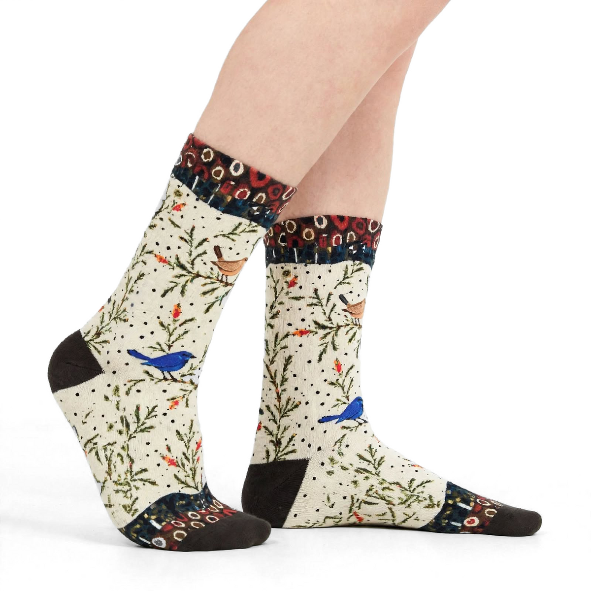 Fairy Wrens by Melanie Hava: cream fairy wren bamboo socks worn on feet, side view.