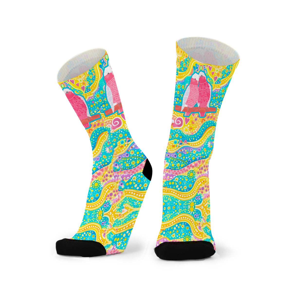 Colorful aboriginal design socks with a pattern on a white background
