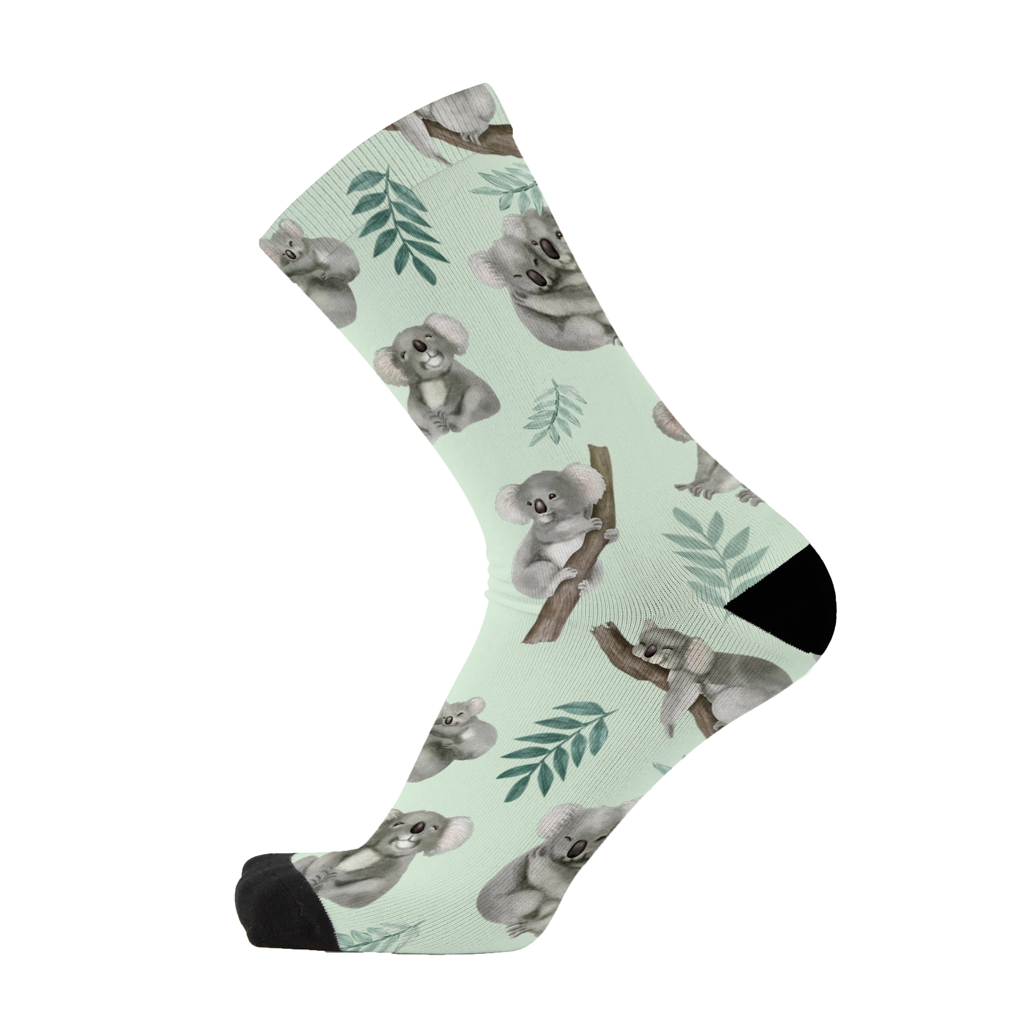 Colourful bamboo socks featuring koalas on a green background.