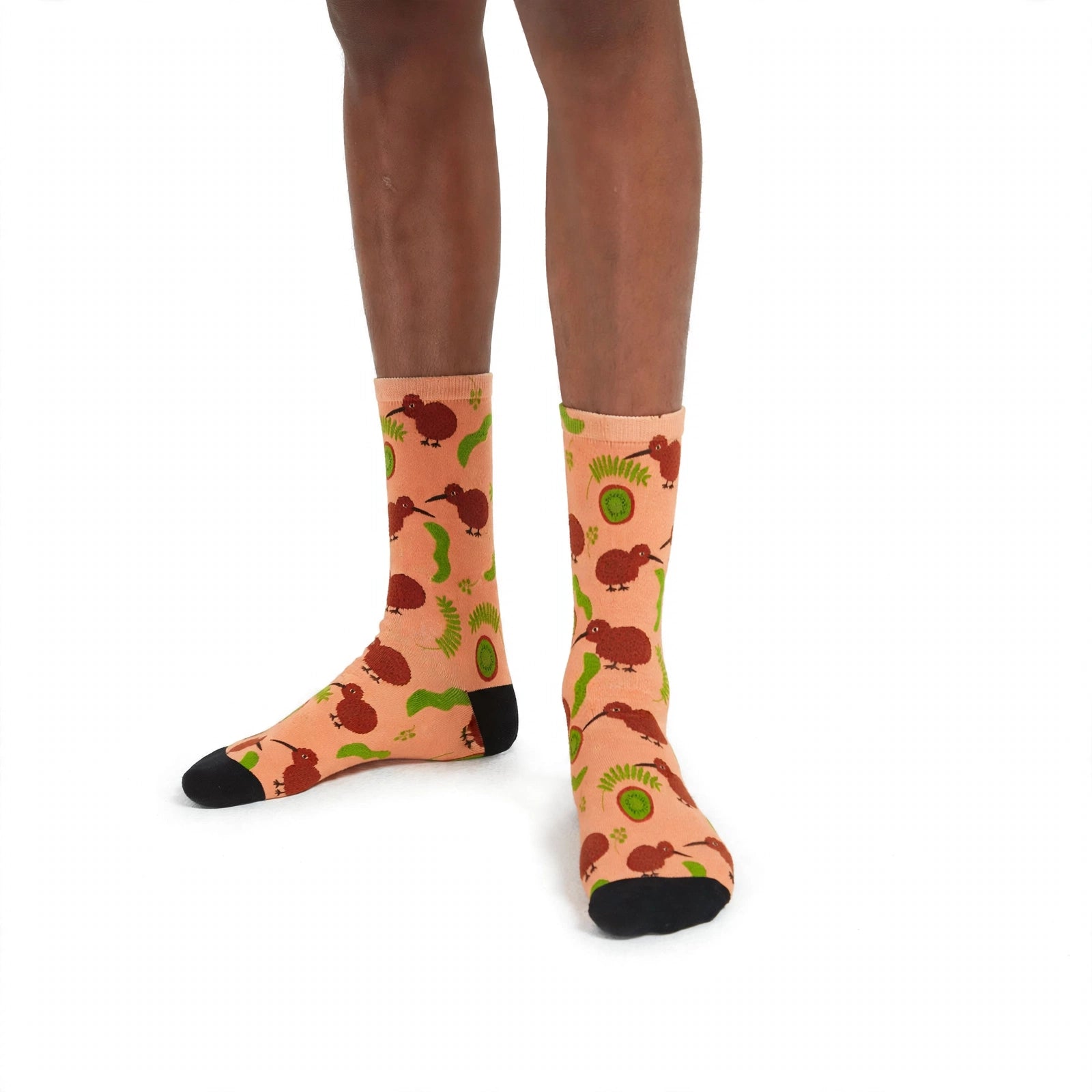 Front view of peach Kiwi Be Friends bamboo socks with New Zealand kiwi bird and fern pattern