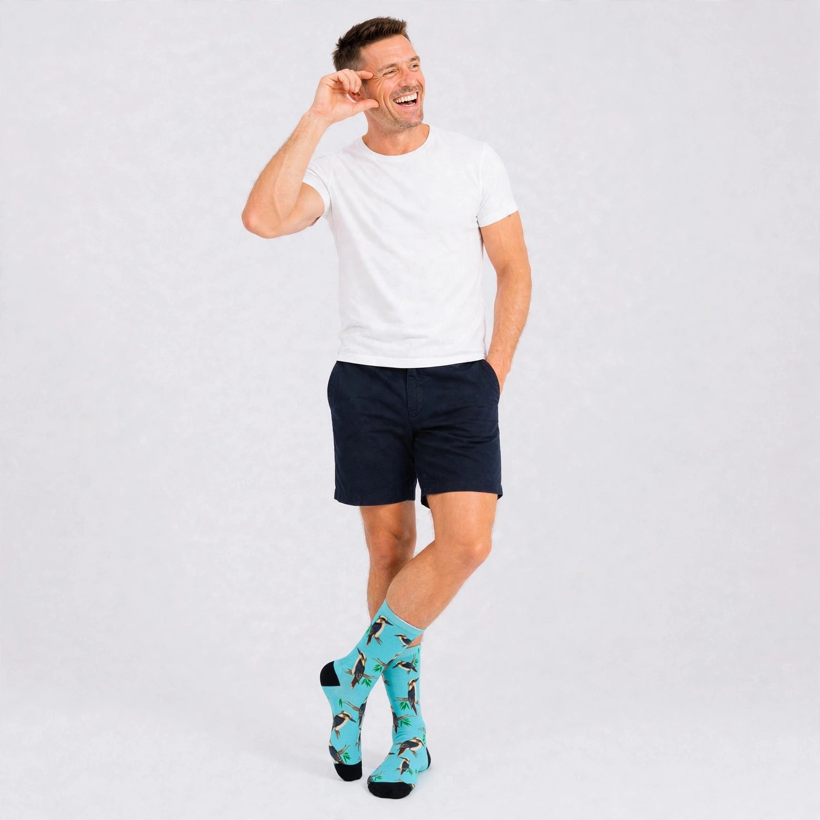 Men wearing blue Kookaburra bamboo socks with seamless toe Australian bird design