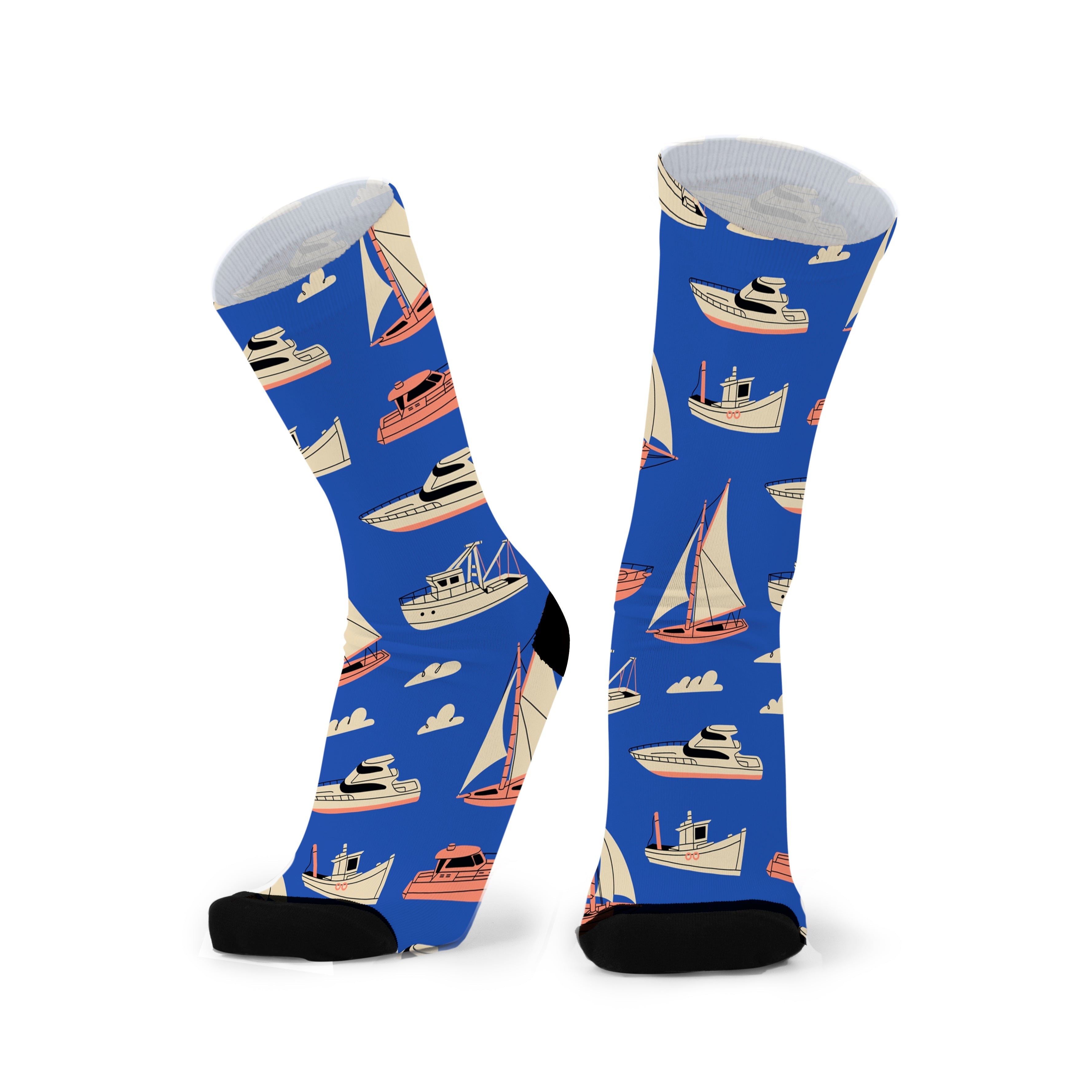 Colourful bamboo socks featuring ships and boats on a blue background.