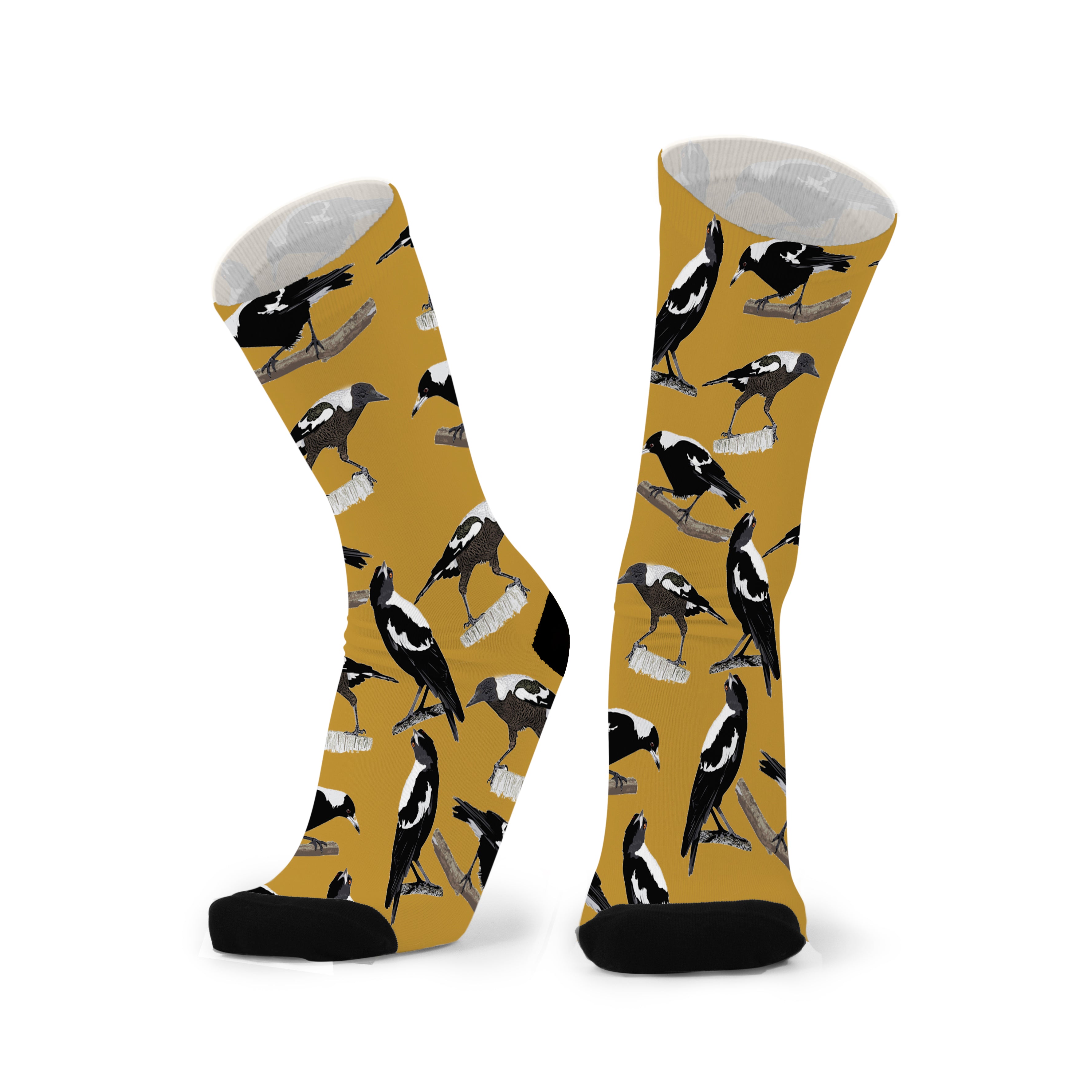 Australian Magpie Bamboo Socks featuring Australia’s iconic black and white magpie. Soft, breathable bamboo socks designed in Australia and perfect for bird lovers. Australian Magpie bamboo socks featuring black and white native Australian magpies on a golden yellow background.