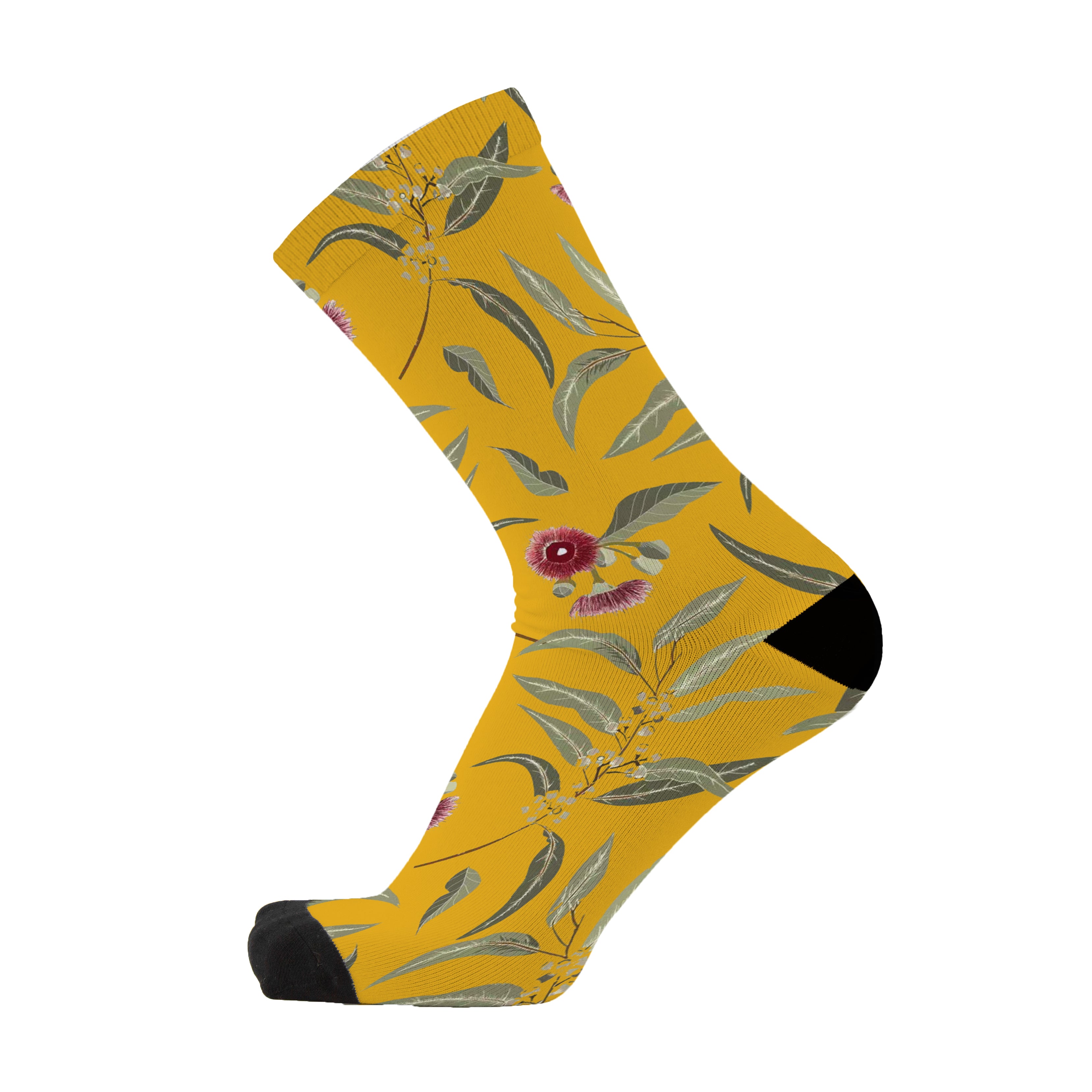 A yellow sock with a gumnut pattern featuring the GumNut Blossom, a red center flower, predominantly in an Australian style.