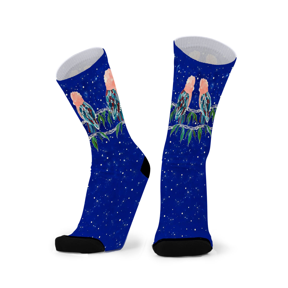 Galahs Under Stars by Melanie Hava: pair of navy bamboo socks with pink galahs on branches beneath stars.