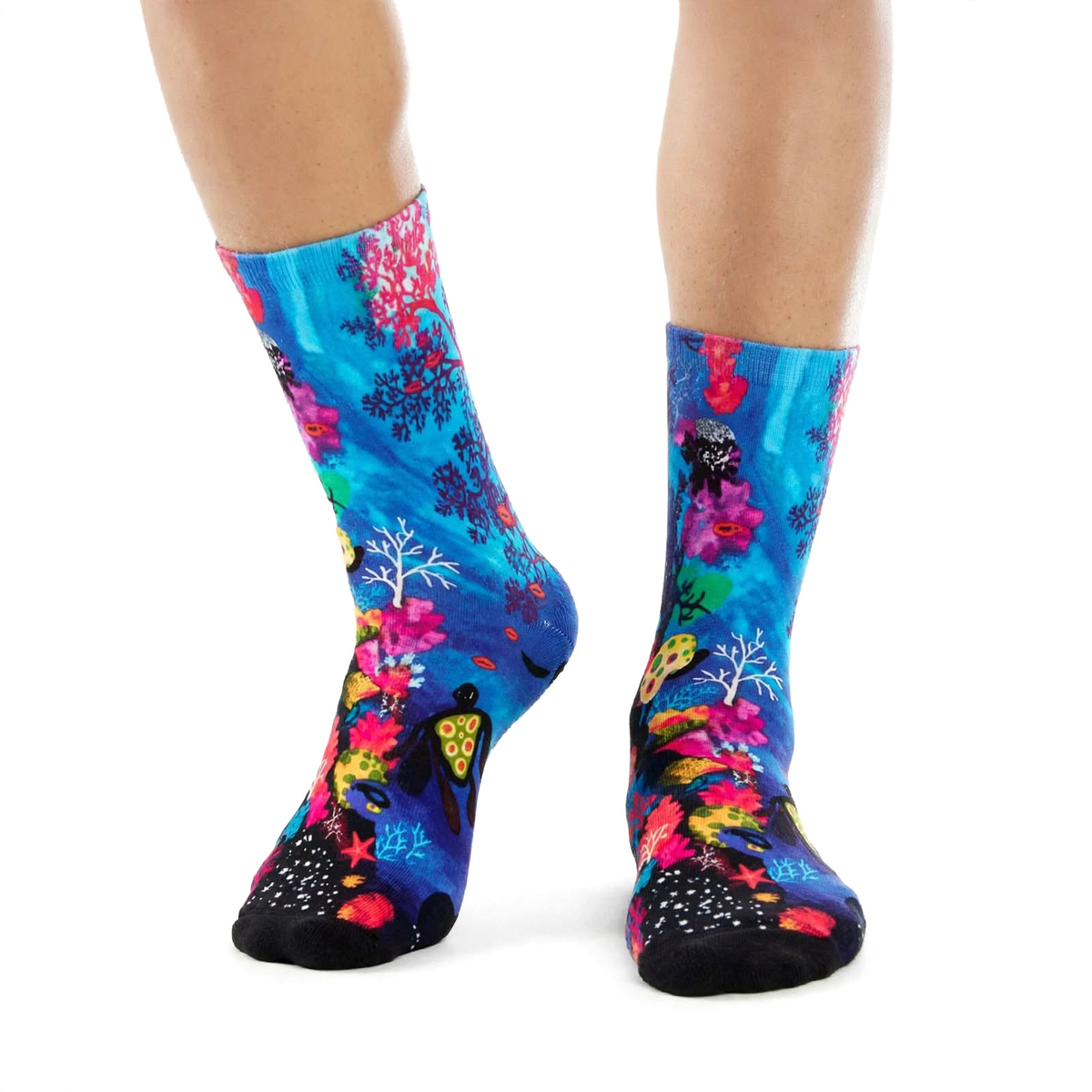Great Barrier Reef by Melanie Hava: blue reef-print bamboo socks worn on feet, angled front view.