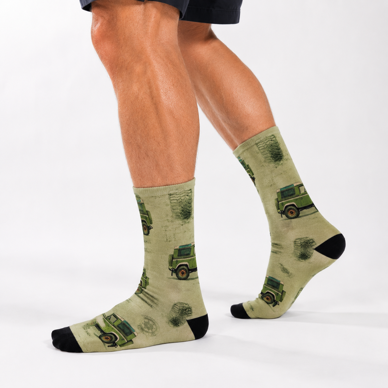 Colourful bamboo socks featuring 4WD car on a light green background.