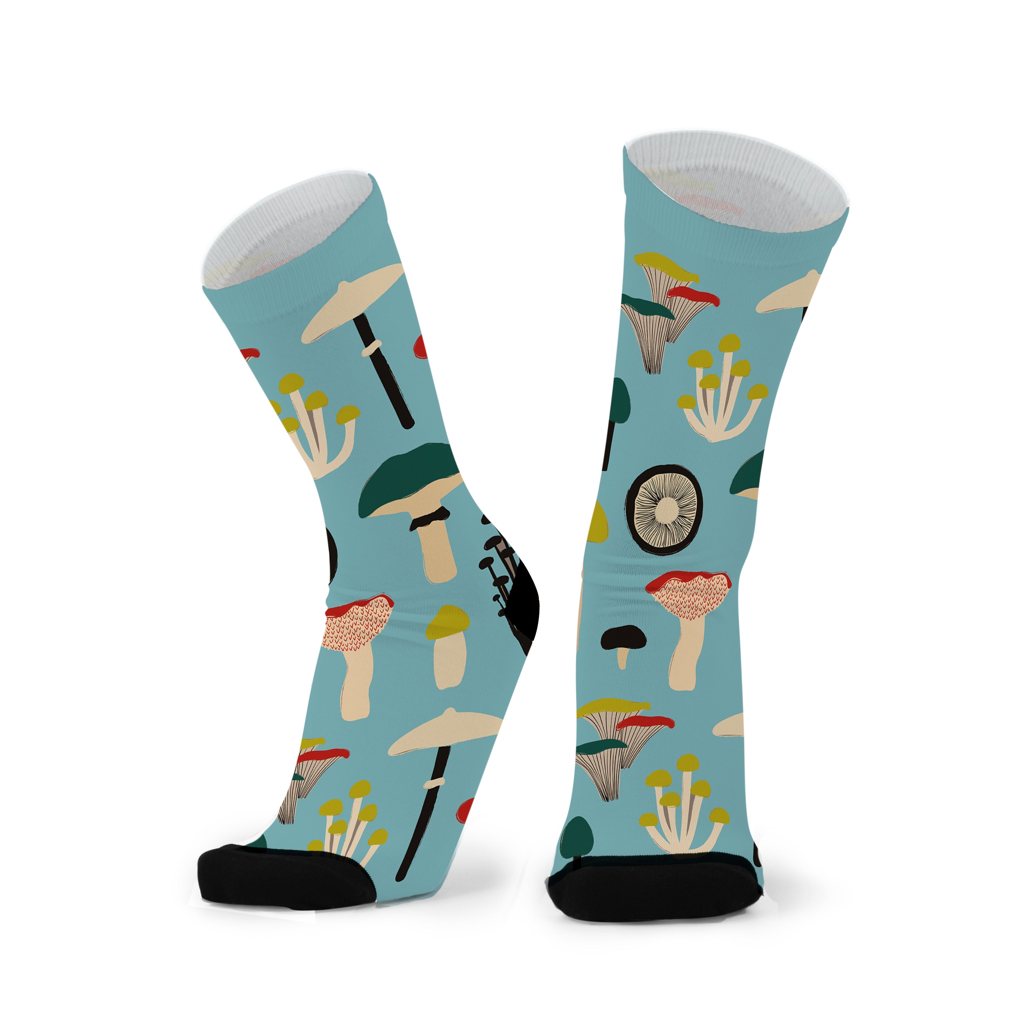 A pair of colorful funky socks with a variety of patterns including mushrooms, a red fox, and other playful elements on a blue background.