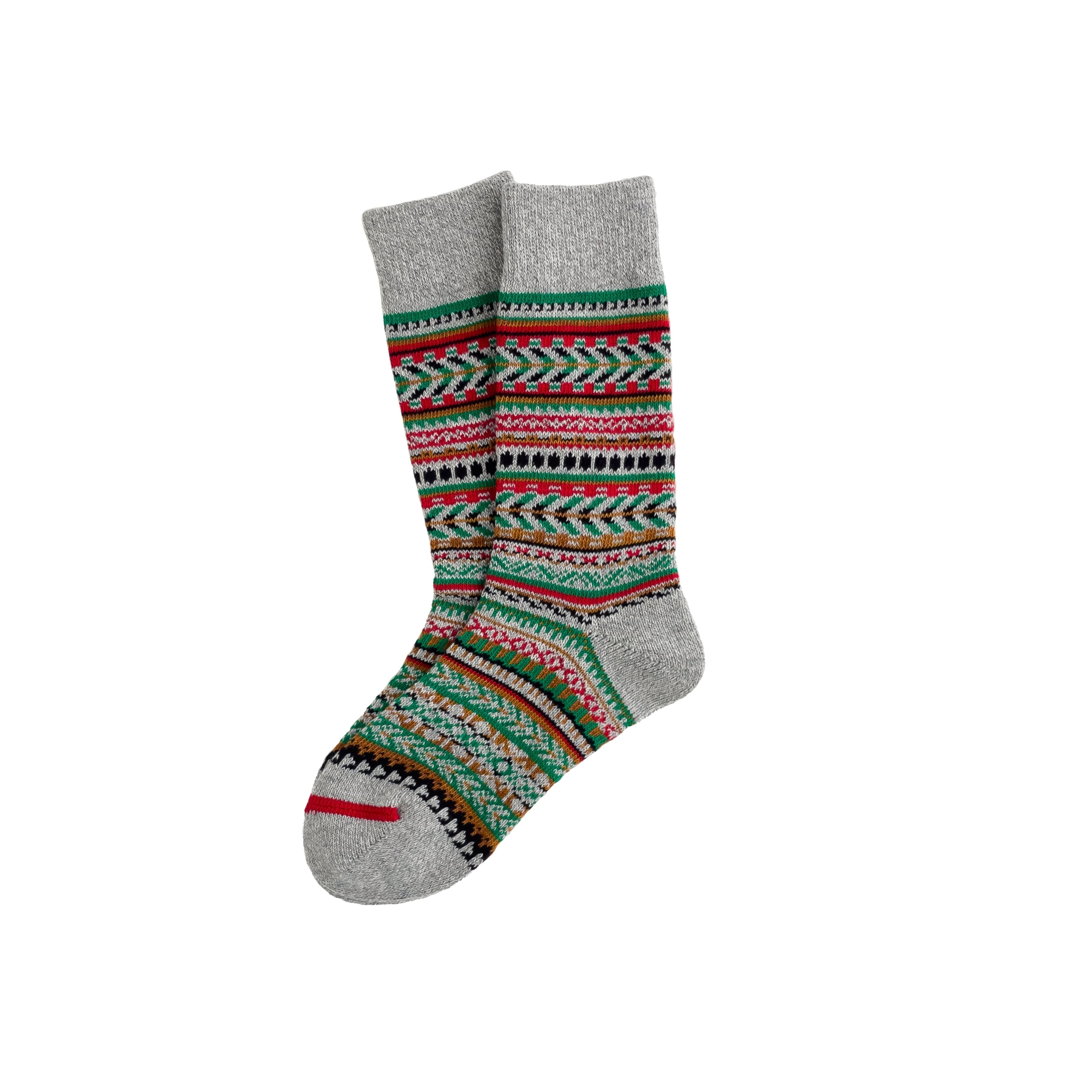 A pair of cotton socks with a nordic pattern in multiple colors.