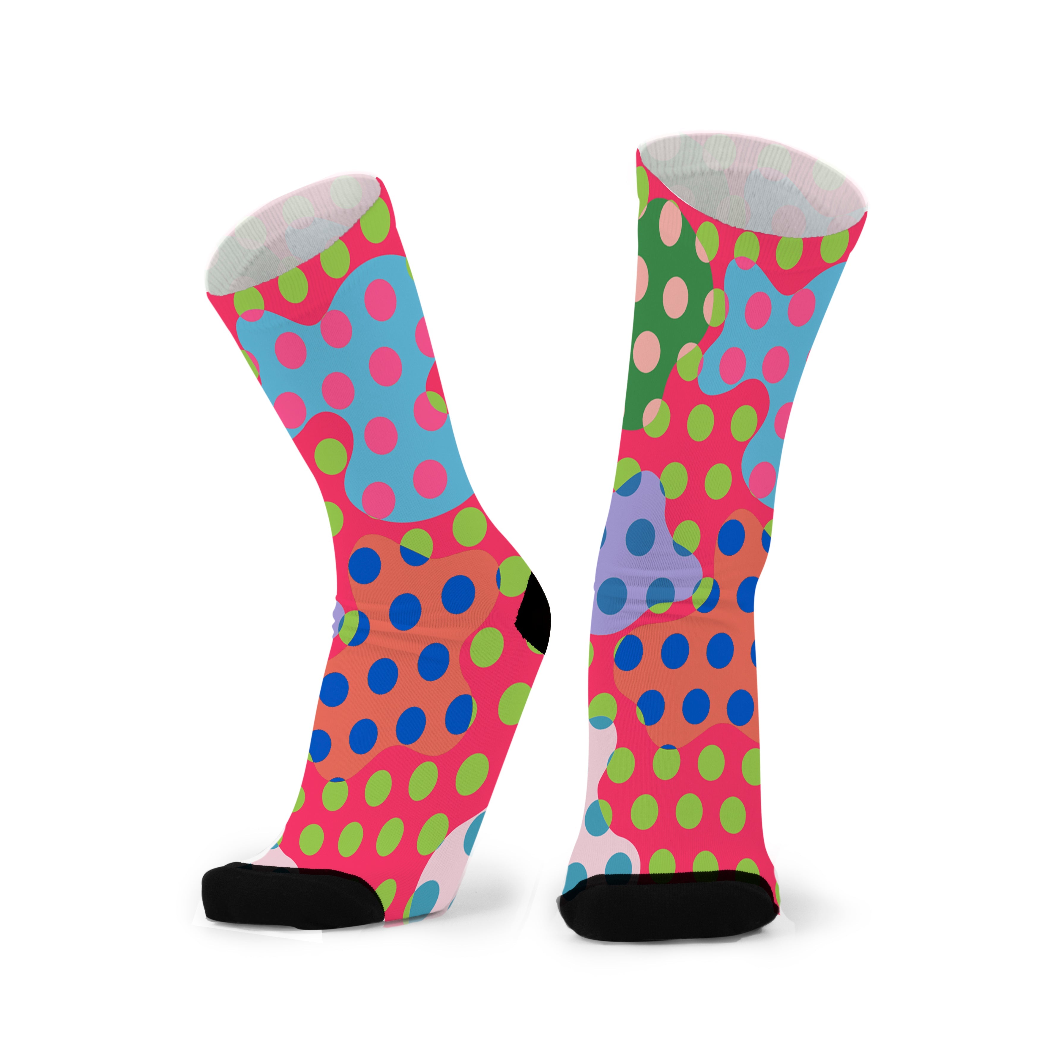 A pair of colorful socks with a polka dot pattern, standing upright.