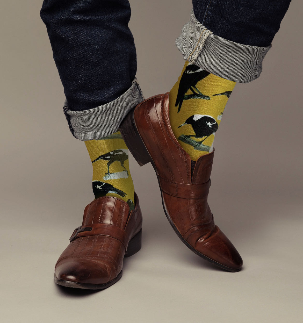 Australian Magpie Bamboo Socks featuring Australia’s iconic black and white magpie. Soft, breathable bamboo socks designed in Australia and perfect for bird lovers. Australian Magpie bamboo socks featuring black and white native Australian magpies on a golden yellow background.